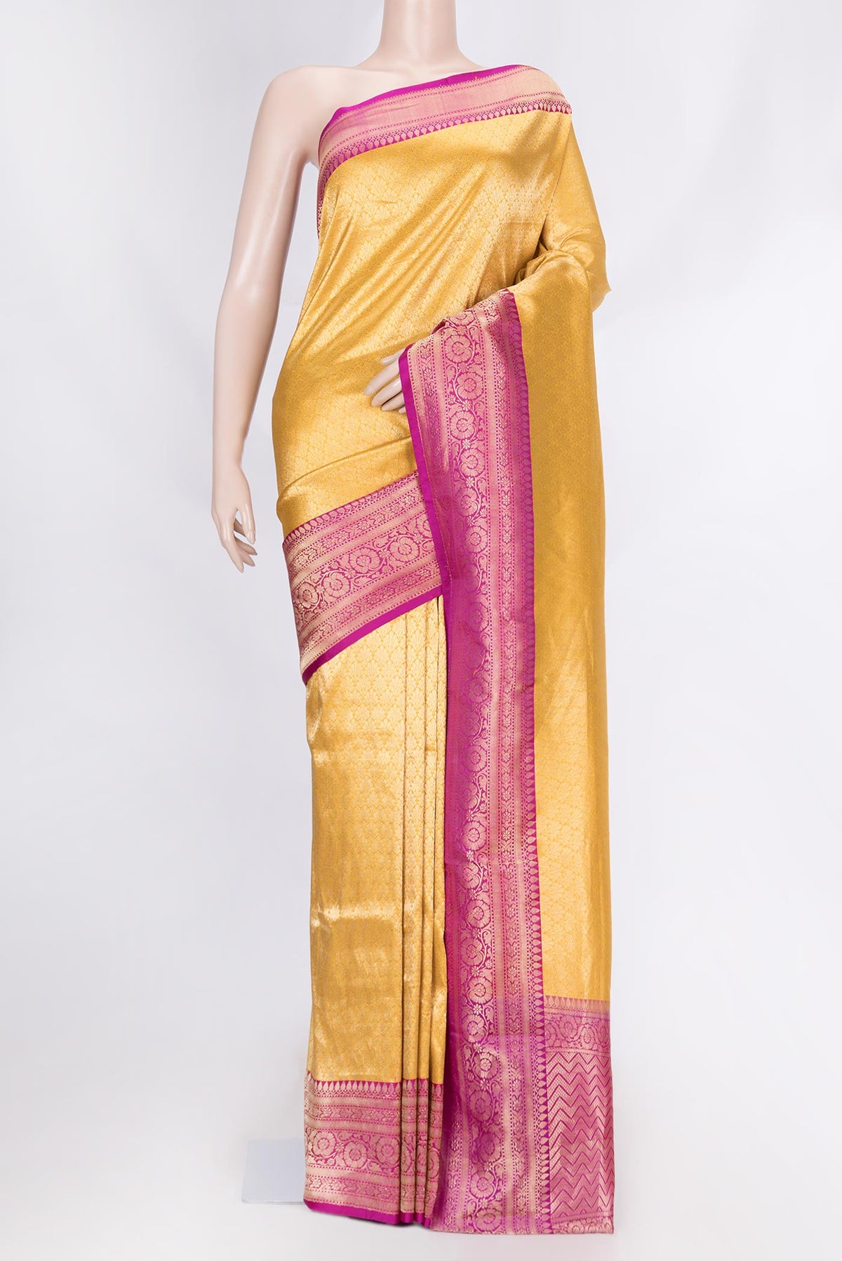 Yellow Dual Tone Banarasi Silk Saree with Zari Brocade on the body and Zari Border displayed on a mannequin