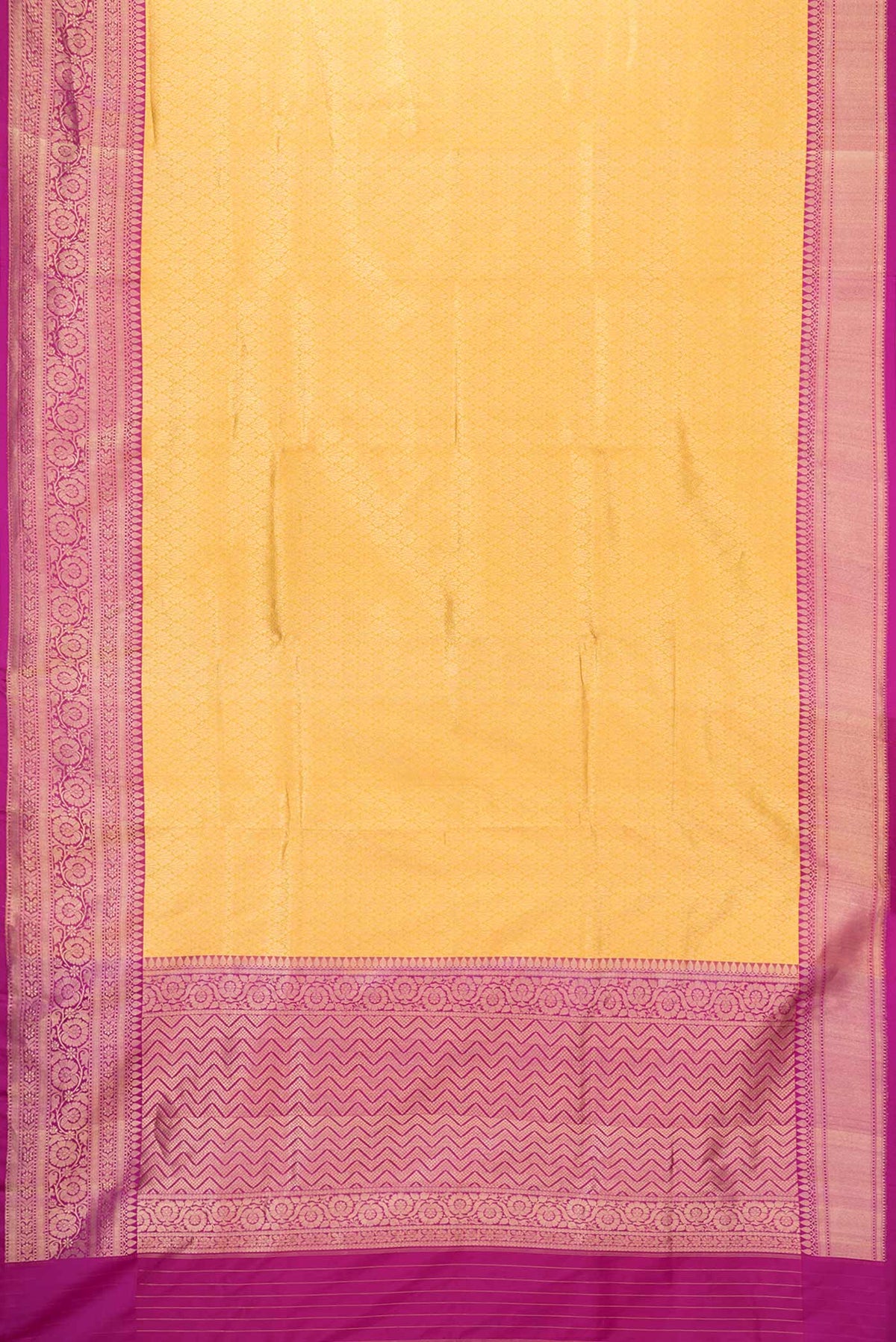 Flat view of Yellow Dual Tone Banarasi Silk Saree with Zari Brocade on the body and Zari Border