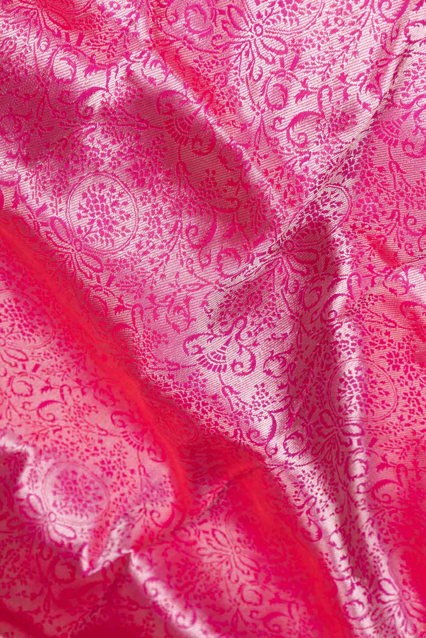 Close up of Pink Dual Tone Banarasi Saree with Zari Brocade on the body and Zari Border displaying folds