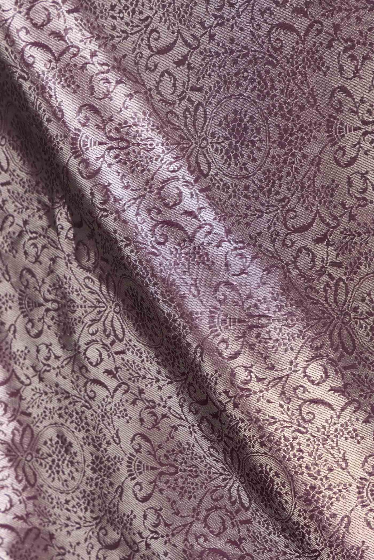 Close up of Coffee Brown Dual Tone Banarasi Silk Saree with Zari Brocade on the body and Zari Border displaying folds
