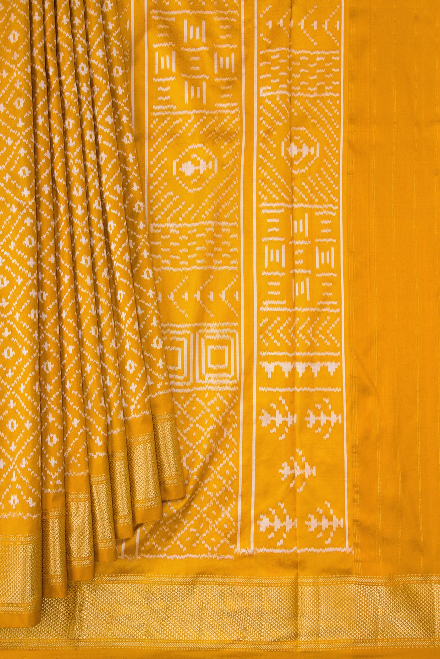 Pleats and pallu of Mustard Dual Tone Double Ikat Nine Yards Saree with Ikat Print on the body and Zari Border. 