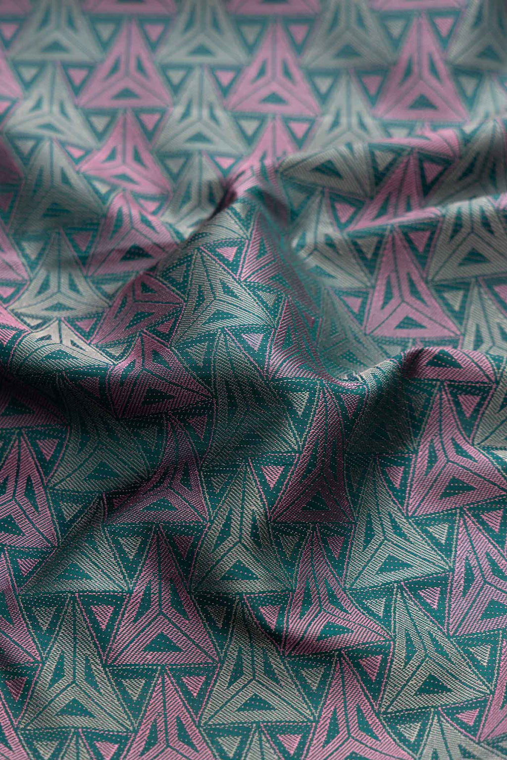 Close up of Bottle Green Dual Tone Kanchipuram Silk Saree with Jacquard design on the body and Fancy Border displaying folds