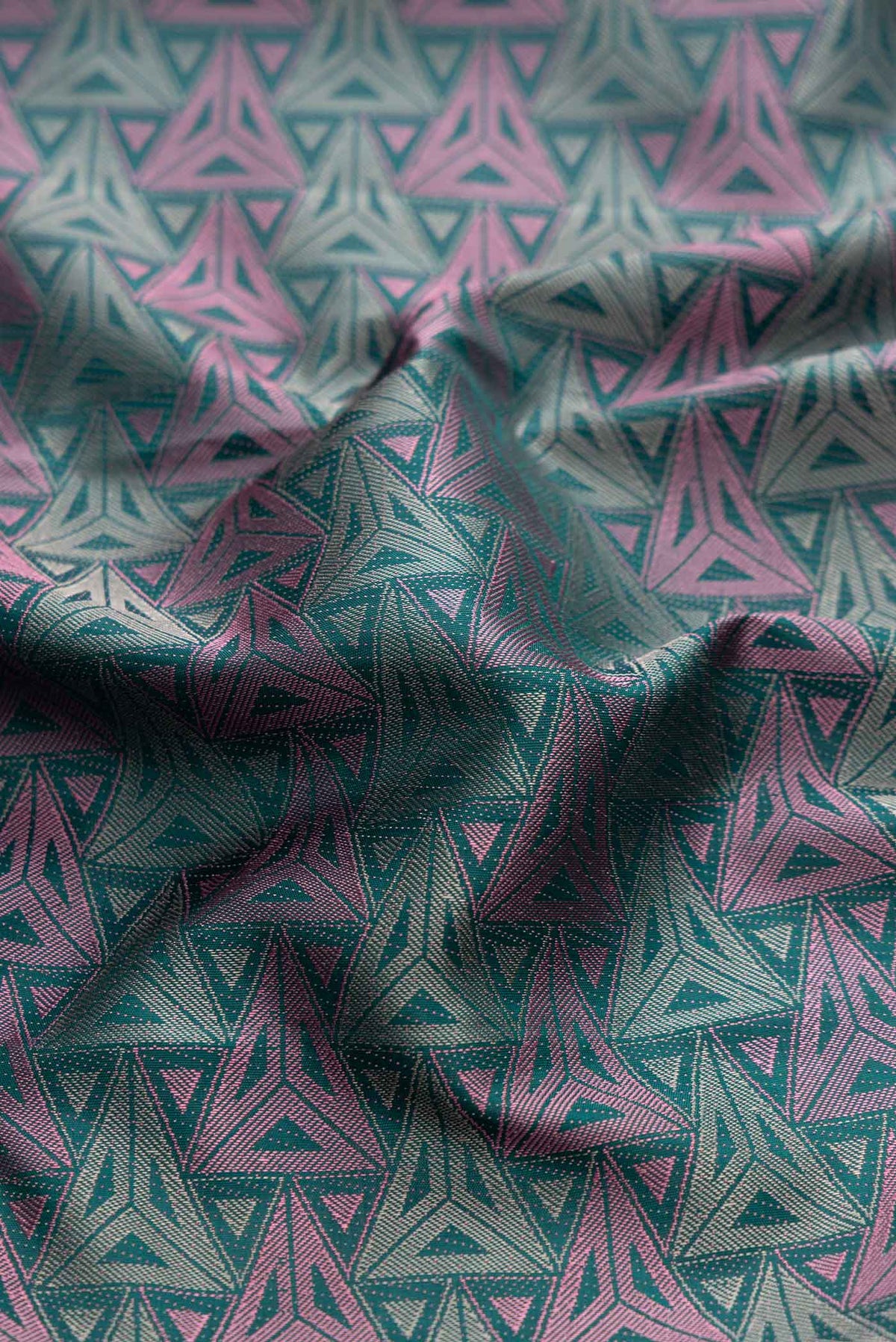 Close up of Bottle Green Dual Tone Kanchipuram Silk Saree with Jacquard design on the body and Fancy Border displaying folds