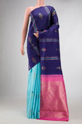 Sky Blue and Navy Blue Color Kanchipuram Silk Saree with Half And Half on the body and Without Border displayed on a mannequin