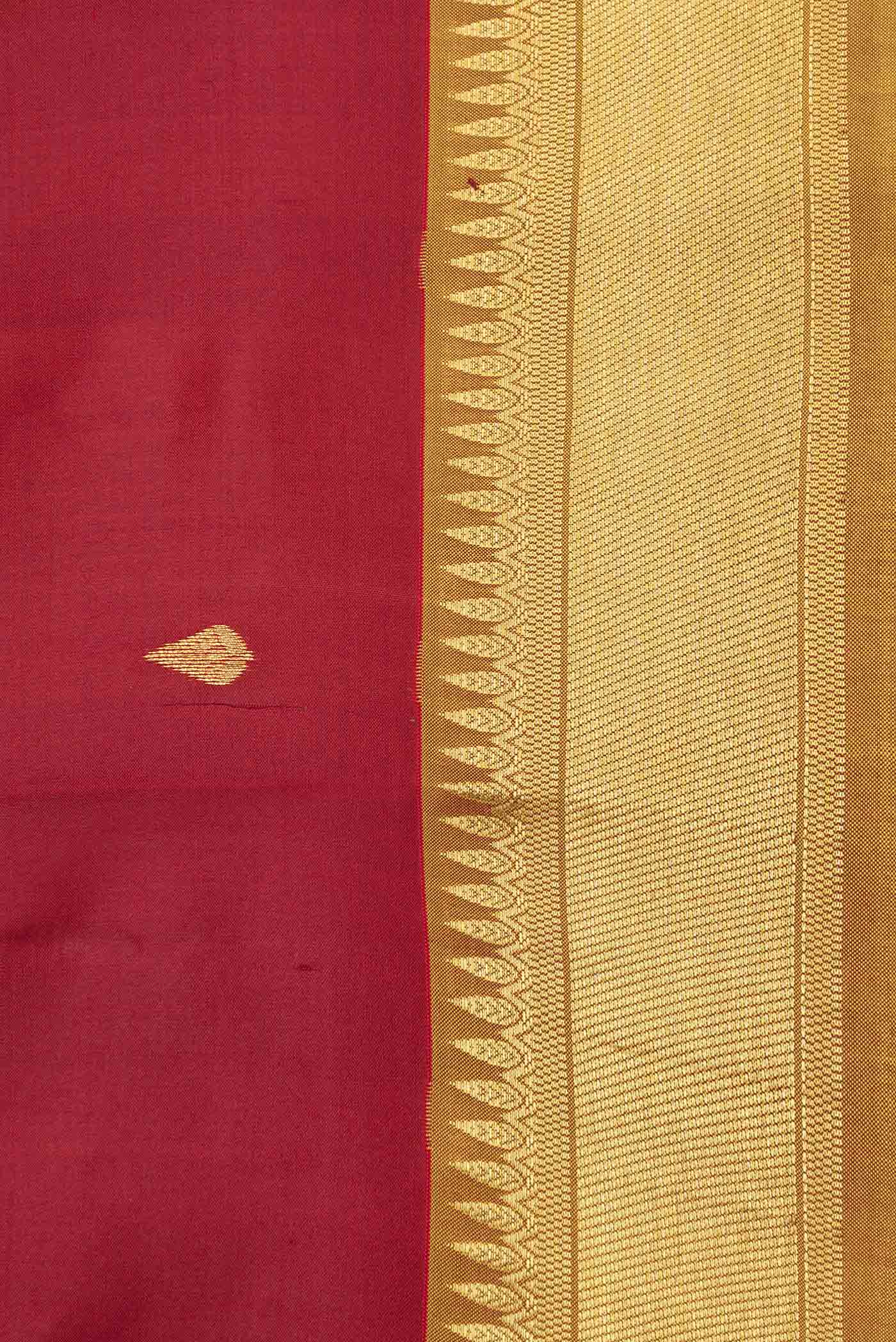 Border image of Maroon Dual Tone Kanjivaram Saree with Zari Butta on the body and Zari Border. 