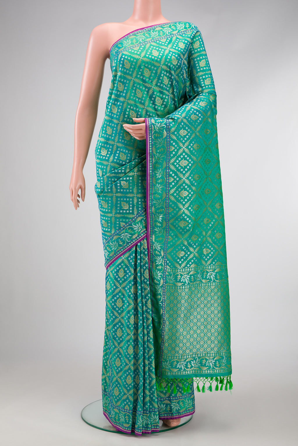 Sea Green Dual Tone Blended Banarasi Silk Saree with Zari Brocade on the body and Zari Border.  displayed on a mannequin