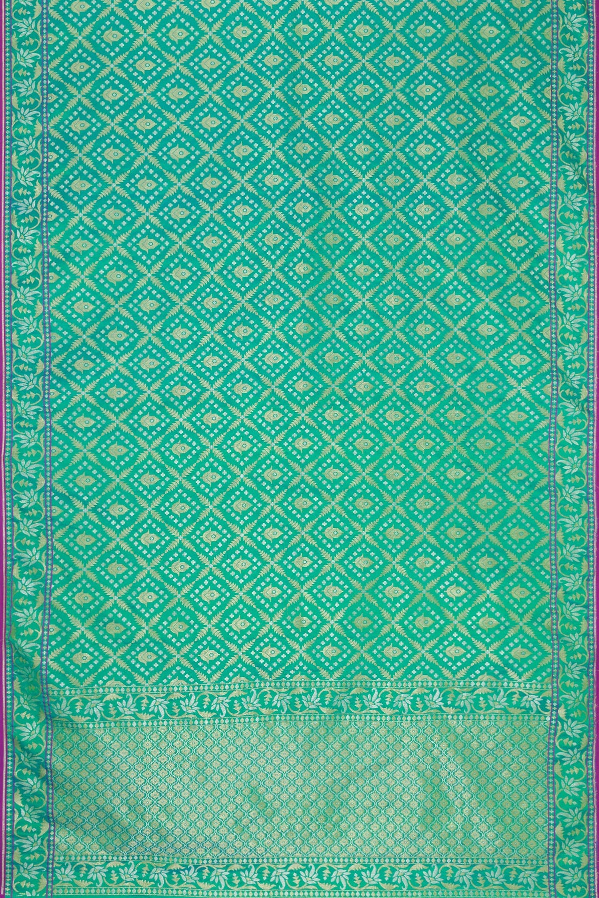 Flat view of Sea Green Dual Tone Blended Banarasi Silk Saree with Zari Brocade on the body and Zari Border. 