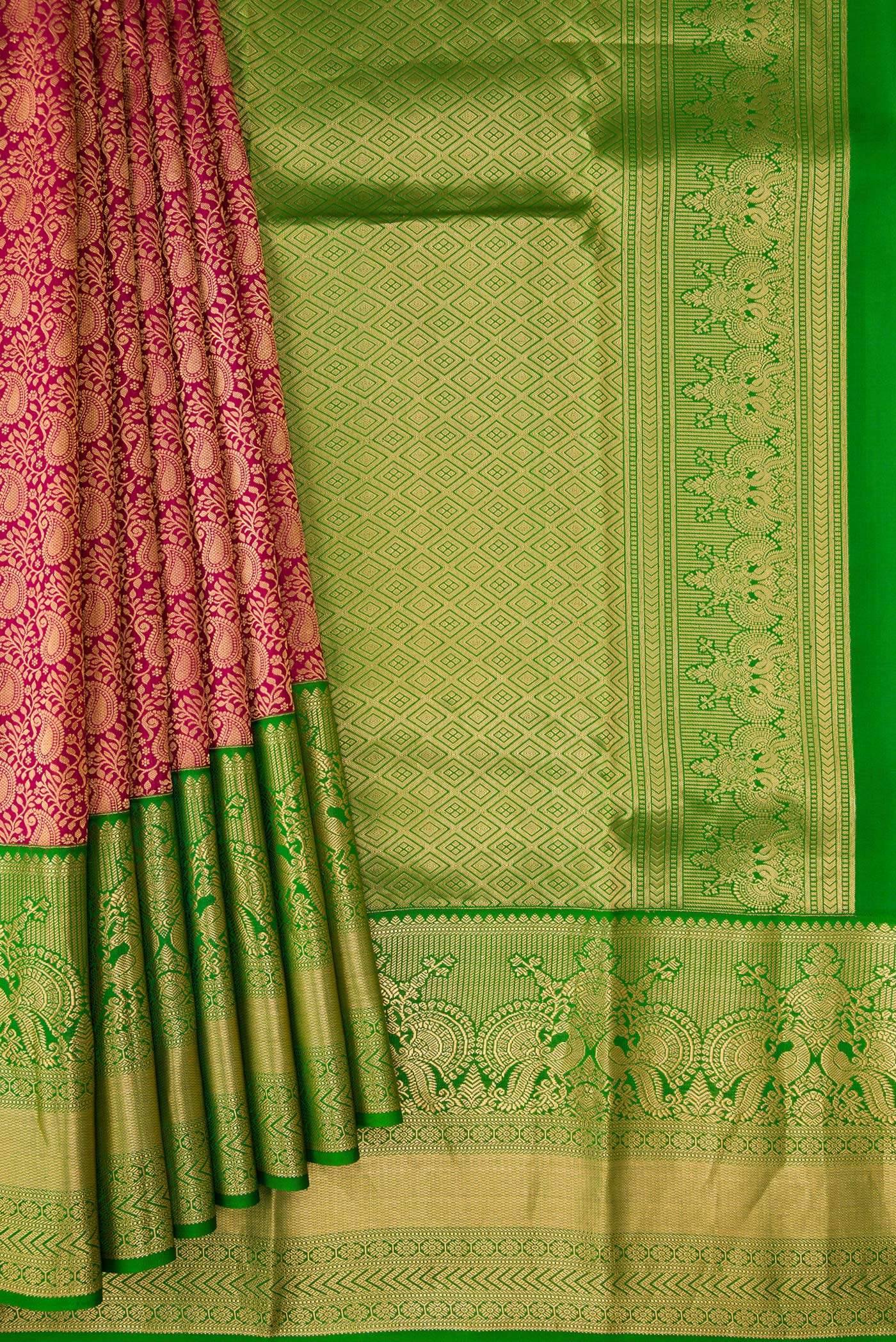 Pleats and pallu of Maroon Dual Tone Kanjivaram Silk Saree with Zari Brocade on the body and Zari Border. 