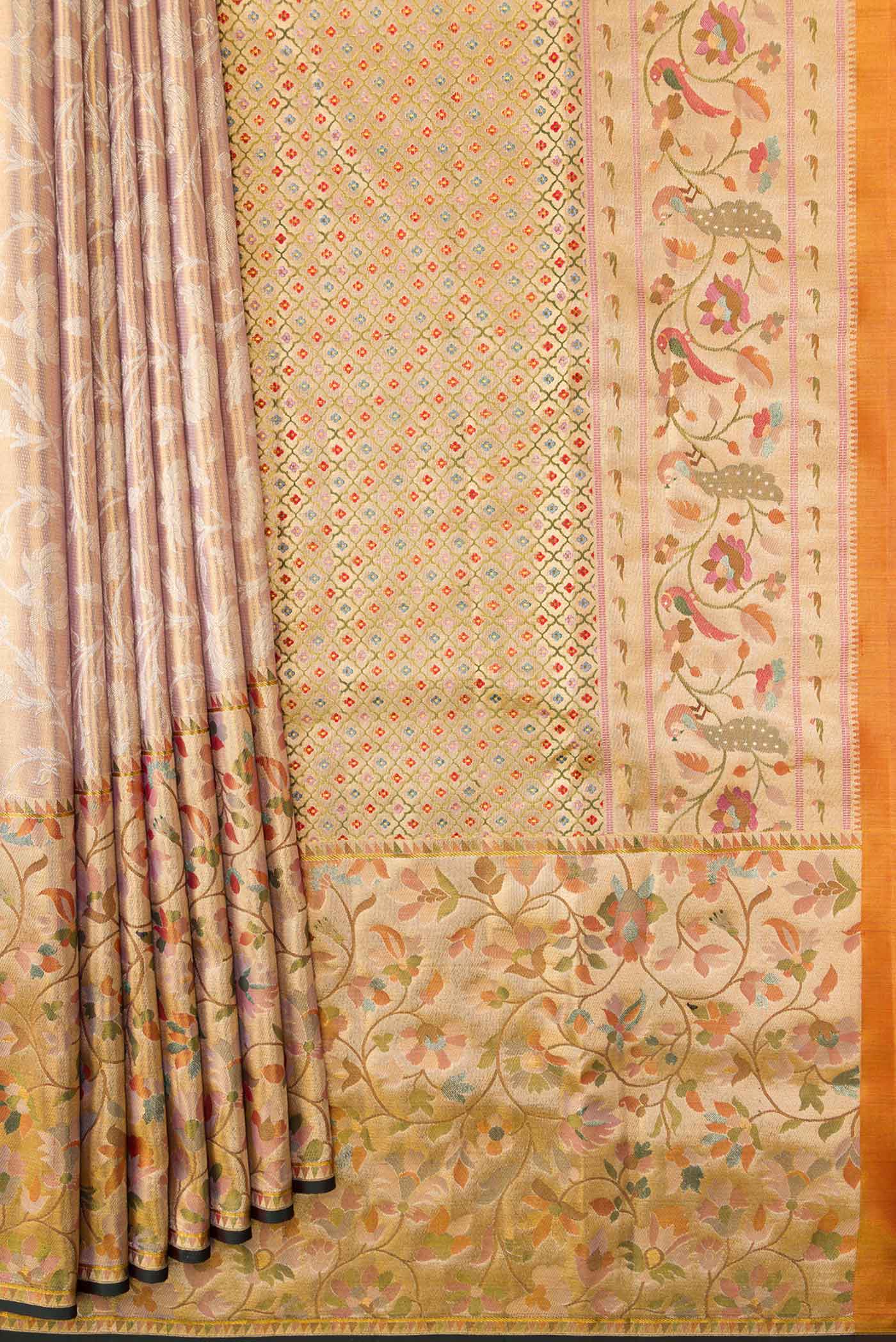 Pleats and pallu of Sandel with Gold Color Kanchipuram Tissue Silk Saree with Zari Brocade on the body and Zari Border