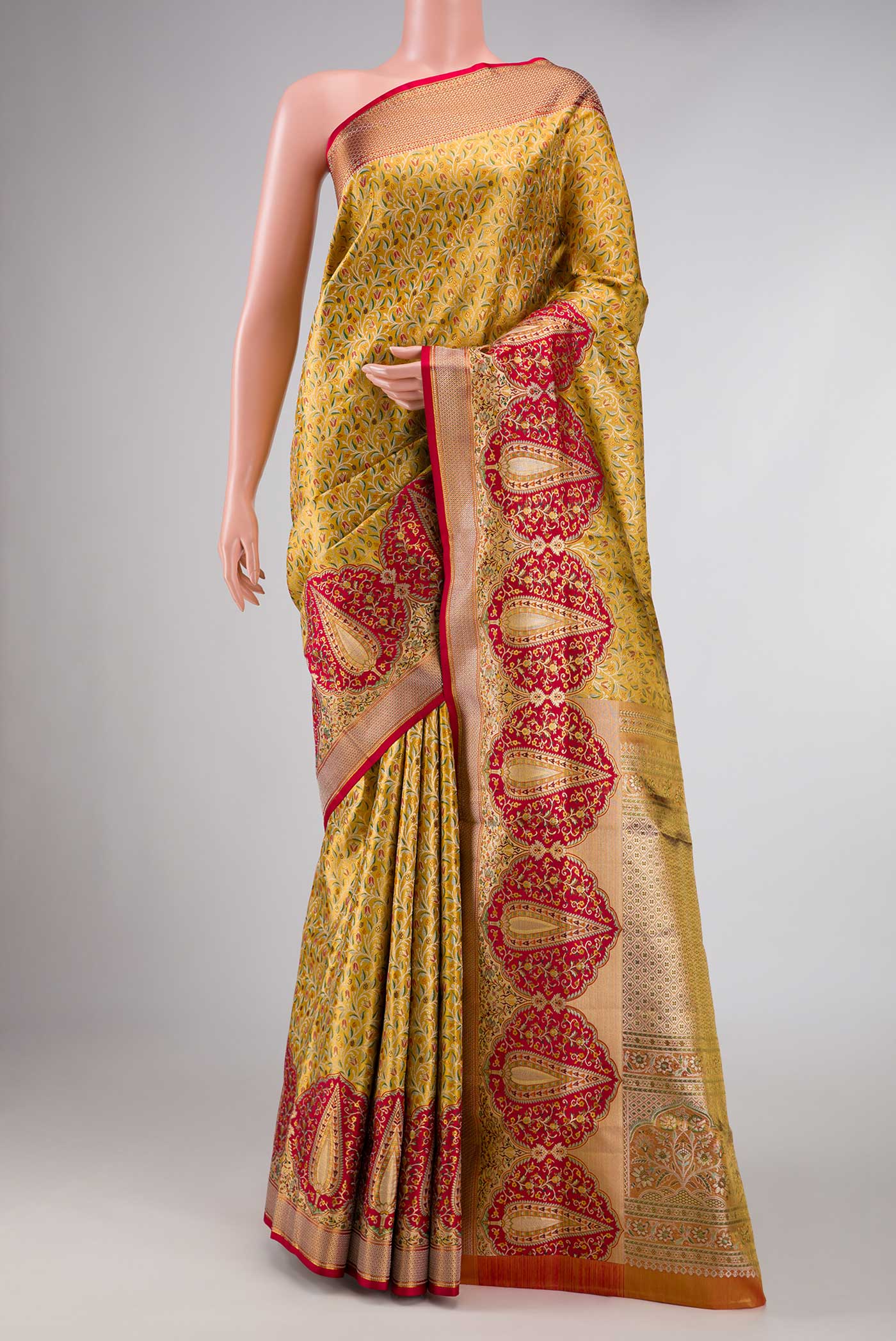 Gold Dual Tone Kanchipuram Tissue Silk Saree with Zari Brocade on the body and Fancy Border displayed on a mannequin