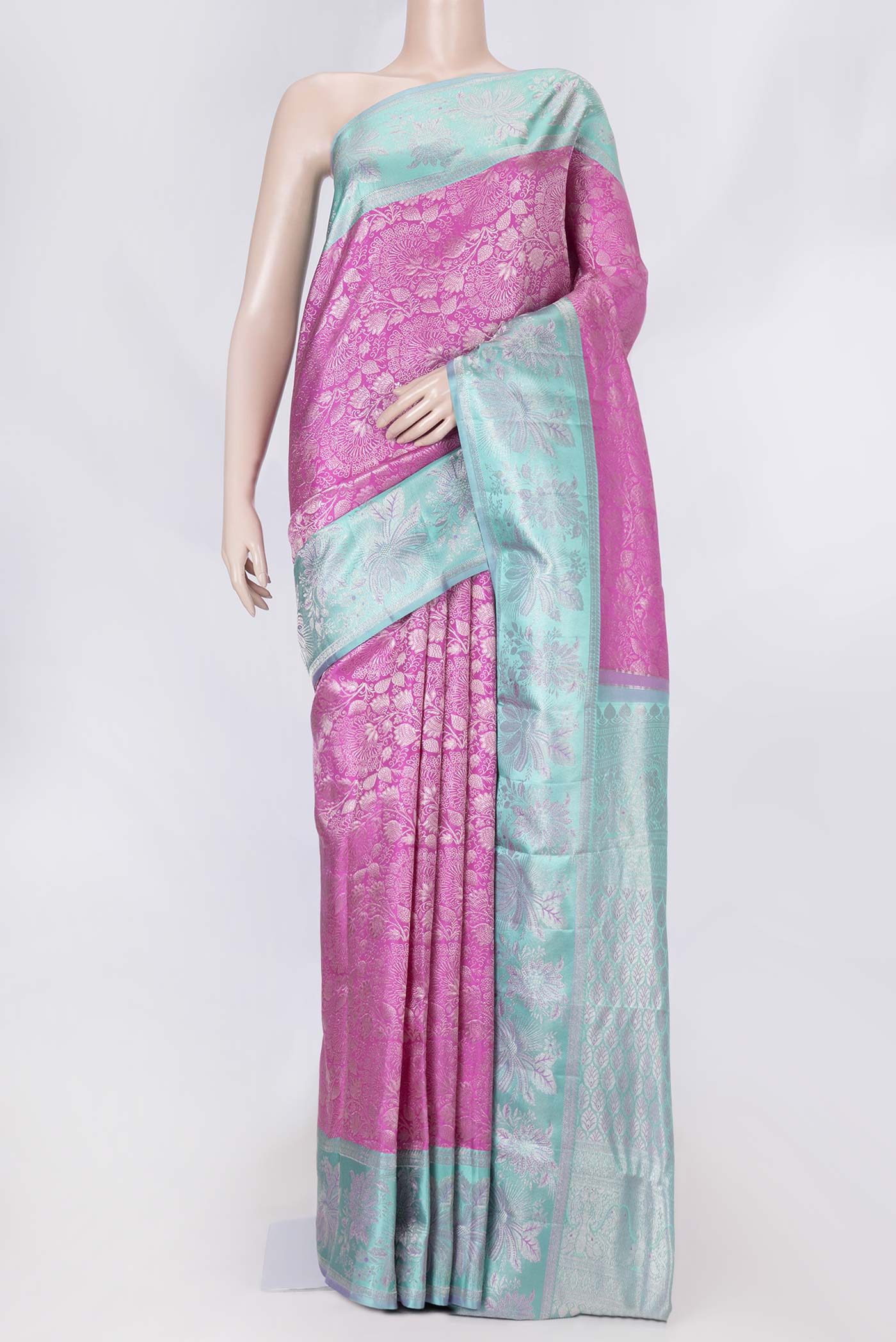 Magenta Dual Tone Kanchipuram Saree with Zari Brocade on the body and Zari Border displayed on a mannequin