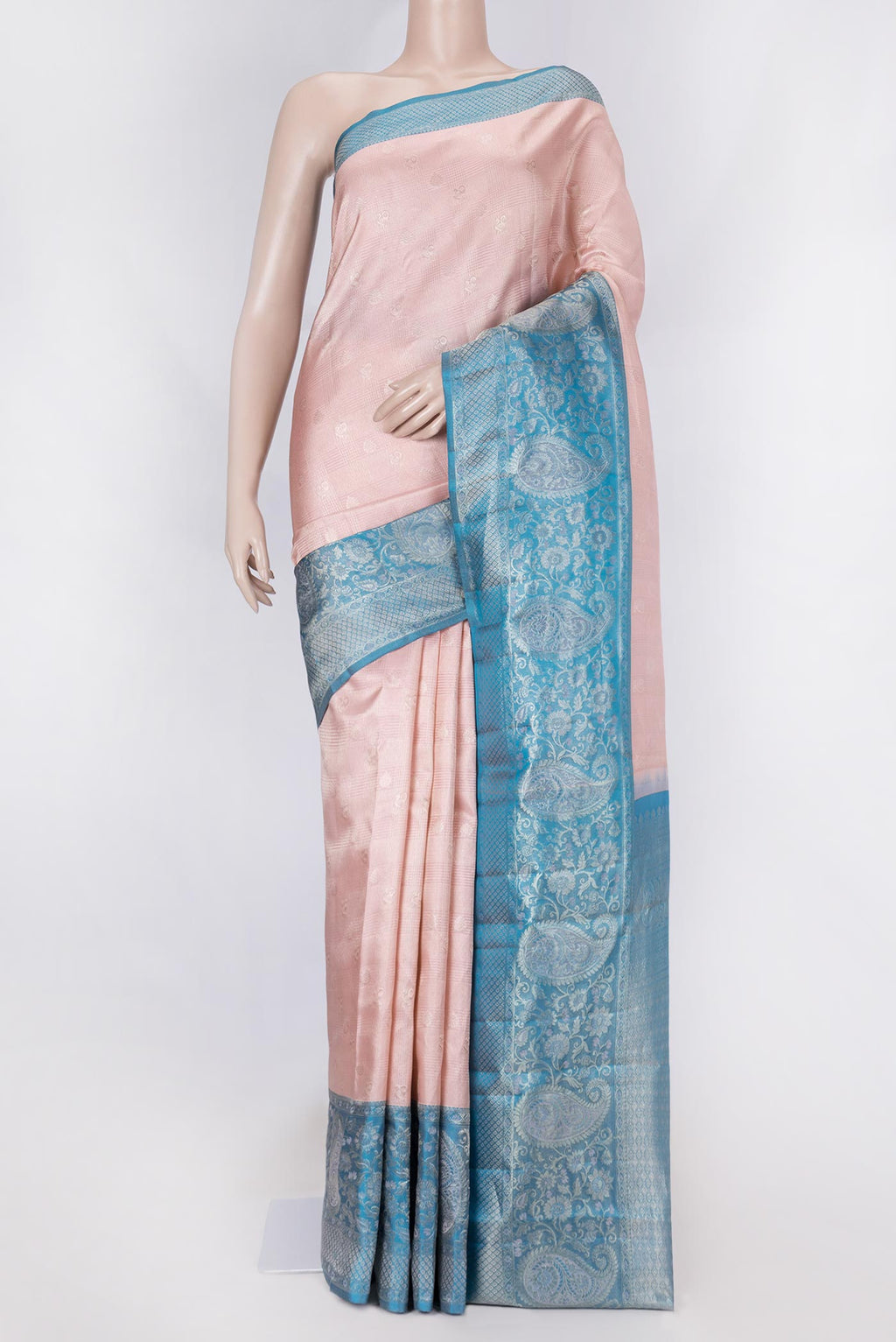 Golden Peach Dual Tone Kanchipuram Saree with Zari Brocade on the body and Zari Border displayed on a mannequin