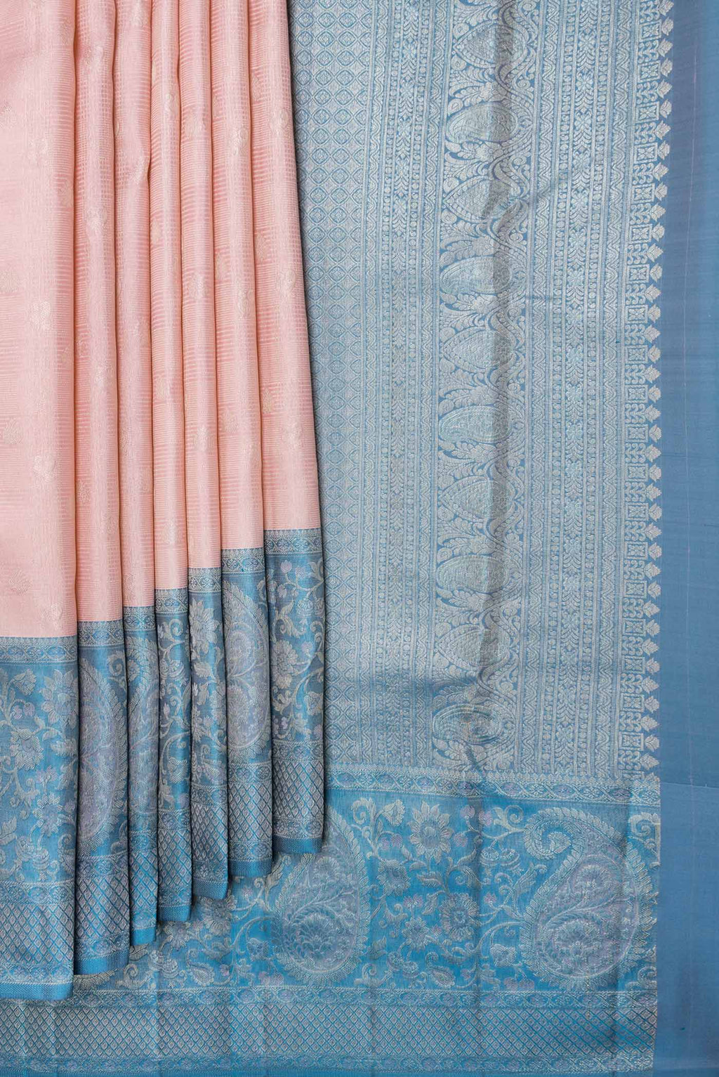 Pleats and pallu of Golden Peach Dual Tone Kanchipuram Saree with Zari Brocade on the body and Zari Border