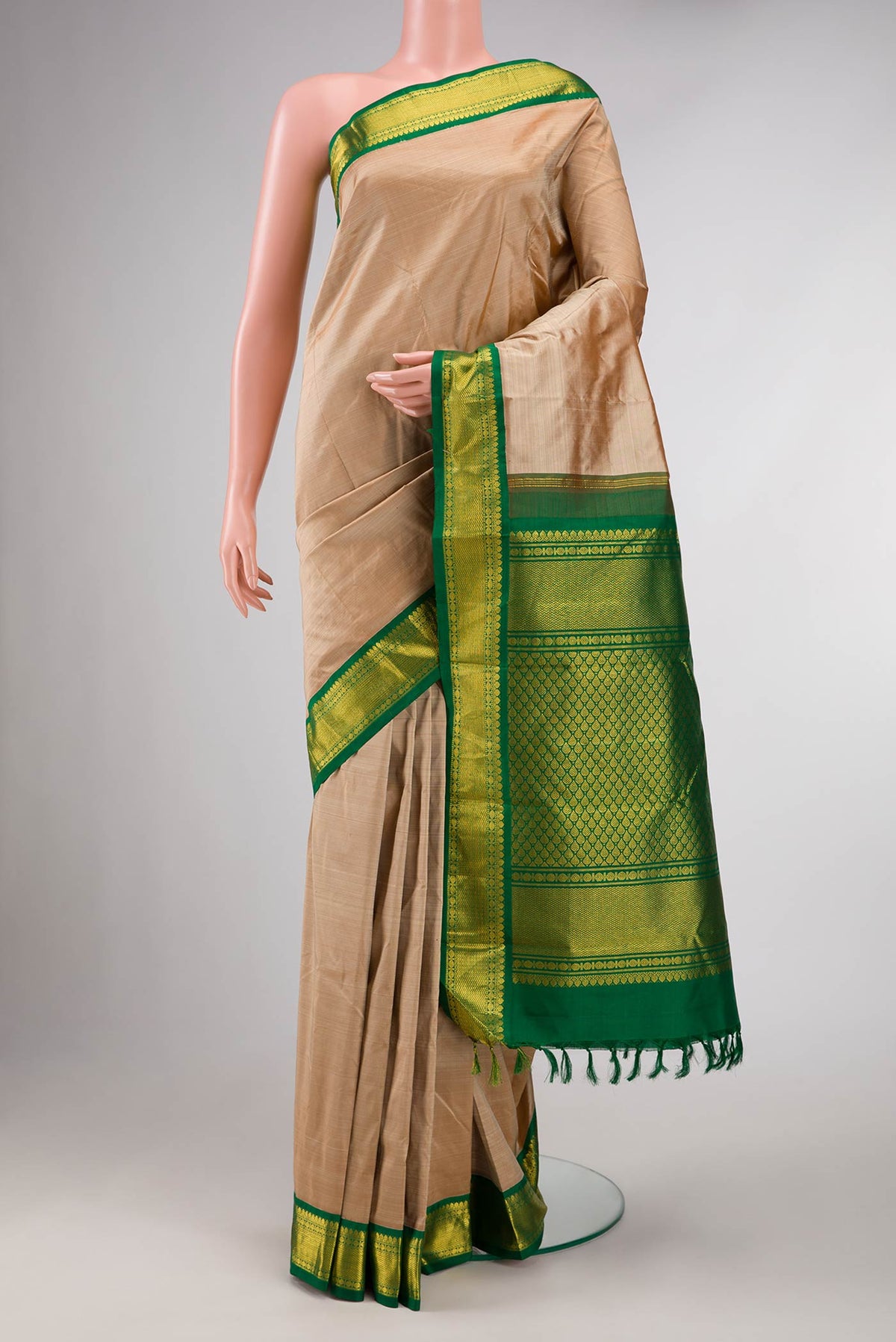 Dark Beige Dual Tone Kanchipuram Silk Saree with Plain Body and Zari Border displayed on a mannequin