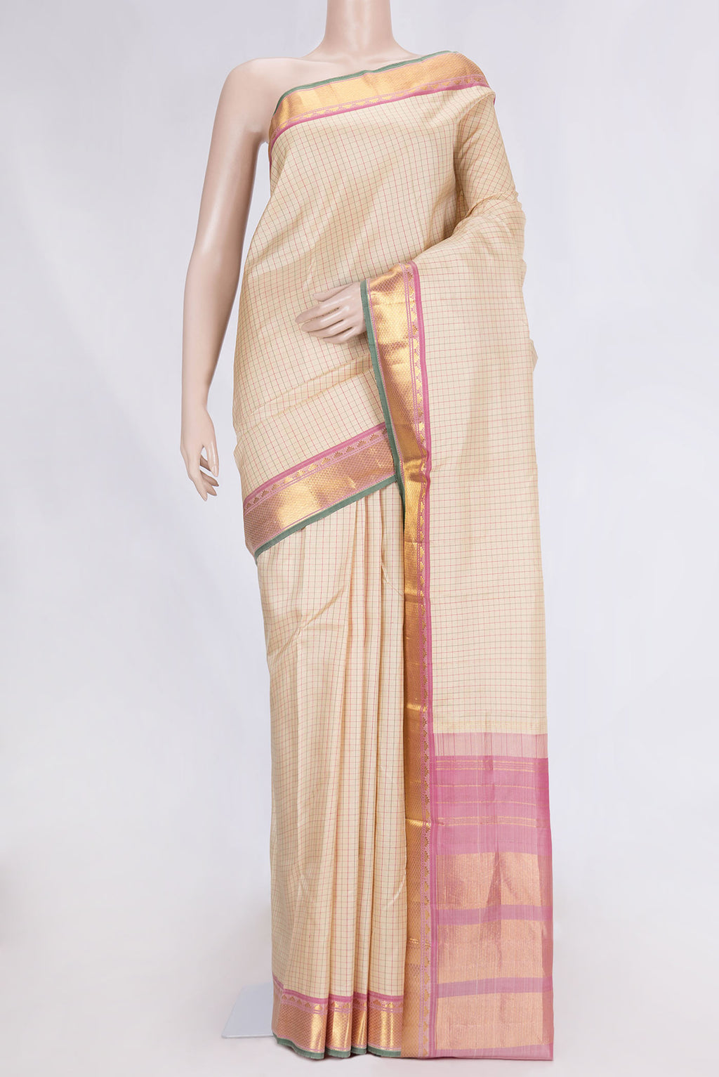 Beige Dual Tone Kanchipuram Silk Saree with Checked design on the body and Zari Border.  displayed on a mannequin