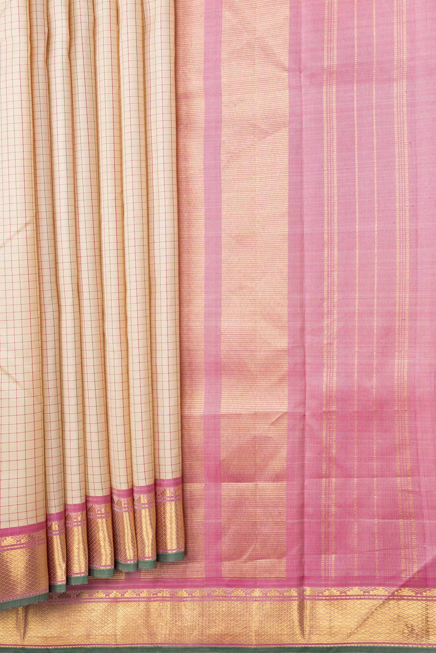 Pleats and pallu of Beige Dual Tone Kanchipuram Silk Saree with Checked design on the body and Zari Border. 