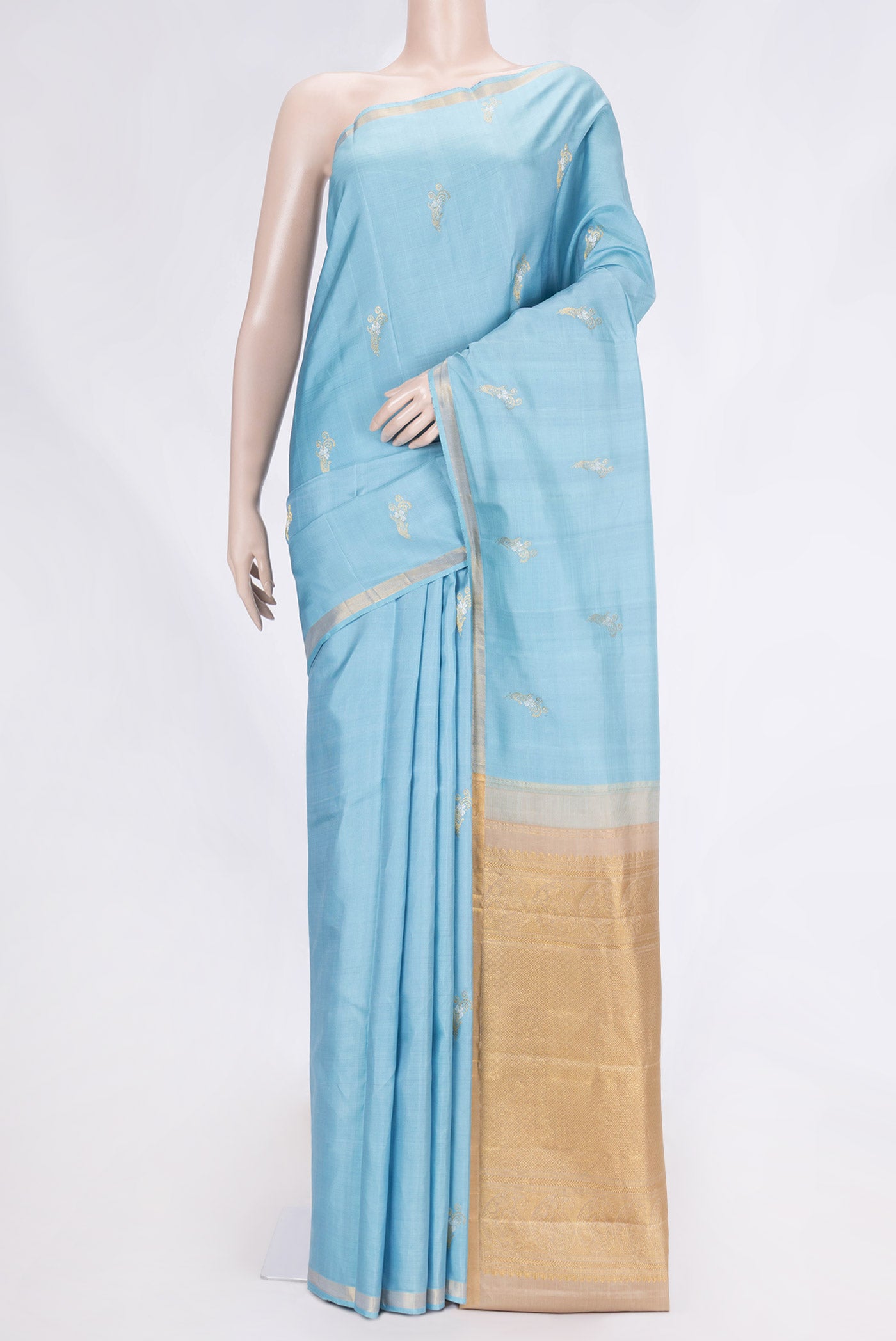 Sky Blue Dual Tone Kanchipuram Silk Saree with Zari Butta on the body and Zari Border.  displayed on a mannequin