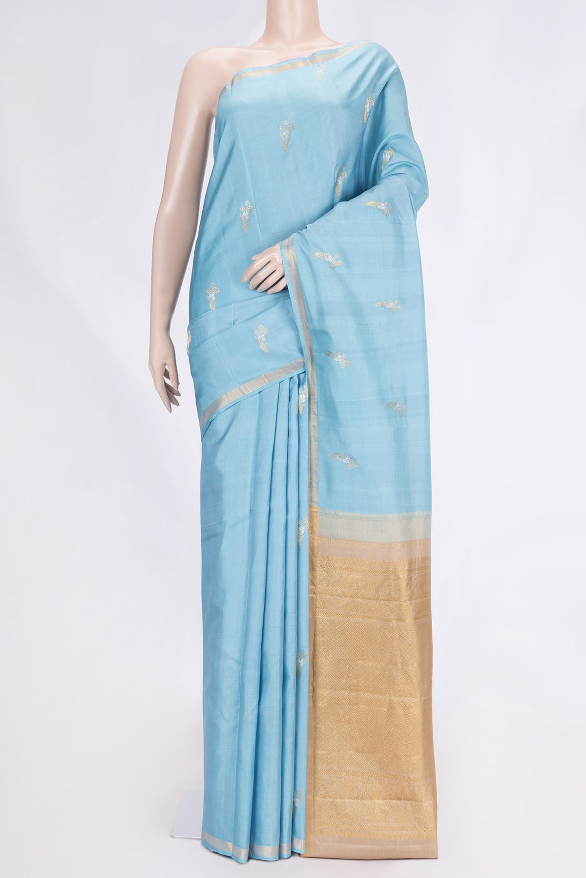 Sky Blue Dual Tone Kanchipuram Silk Saree with Zari Butta on the body and Zari Border.  displayed on a mannequin
