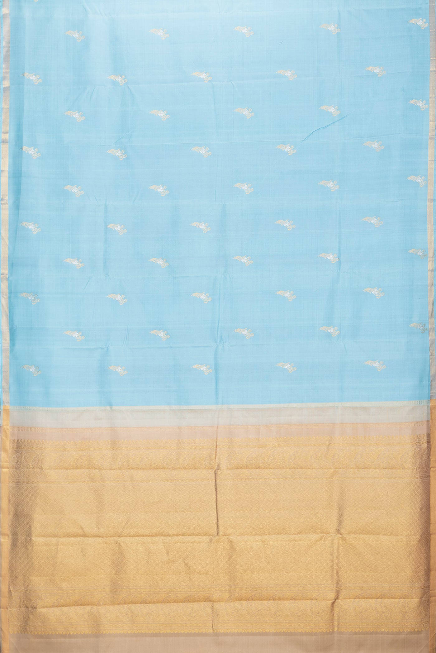 Flat view of Sky Blue Dual Tone Kanchipuram Silk Saree with Zari Butta on the body and Zari Border. 