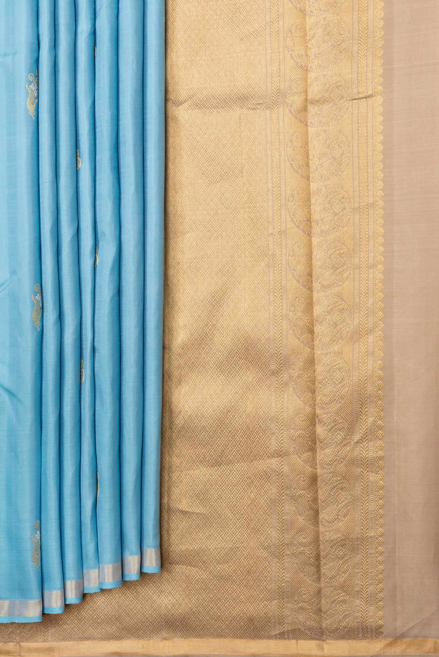 Pleats and pallu of Sky Blue Dual Tone Kanchipuram Silk Saree with Zari Butta on the body and Zari Border. 