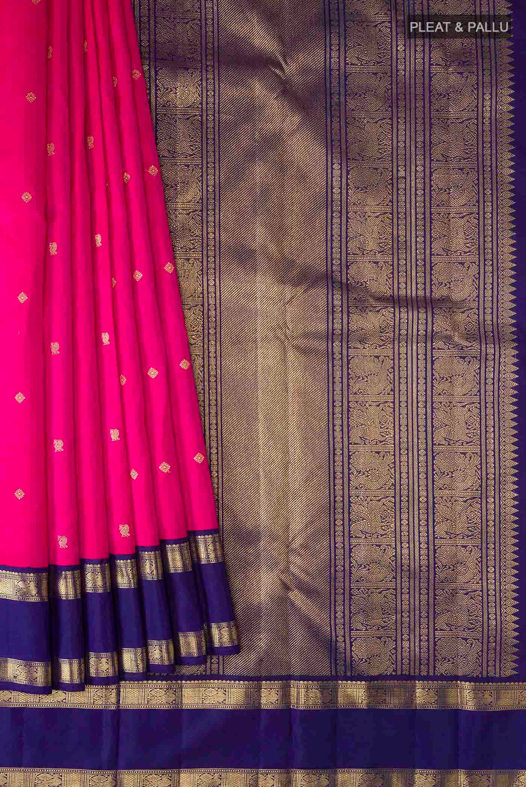 Pleats and pallu of Pink Kanchipuram Silk Saree with Zari Butta on the body and Zari Border
