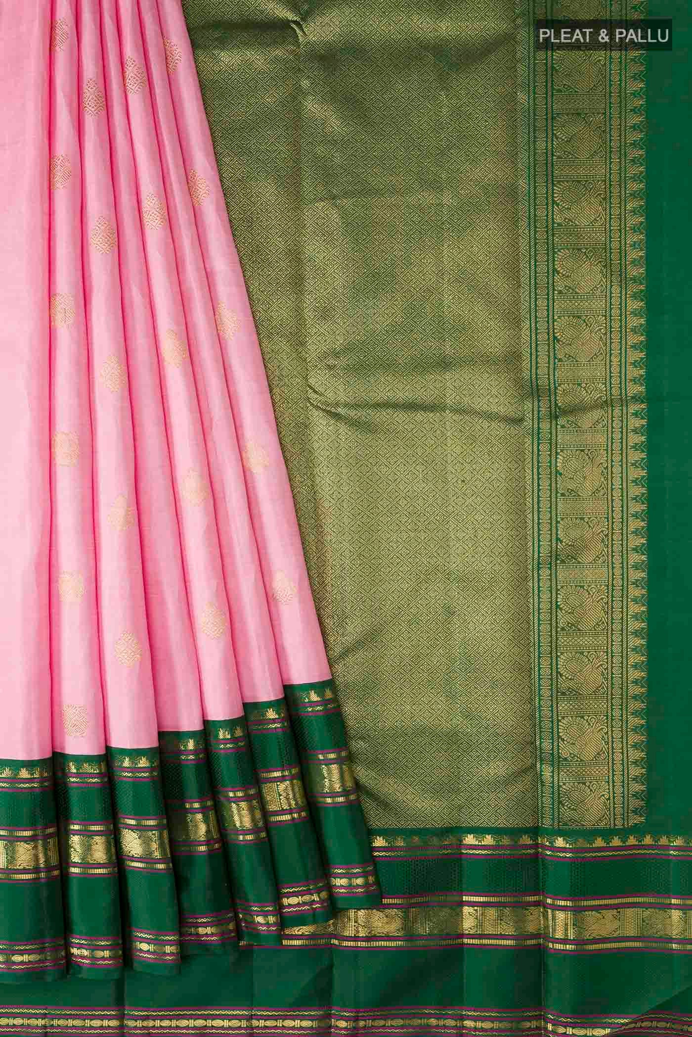 Pleats and pallu of Pink Kanchipuram Silk Saree with Zari Butta on the body and Zari Border