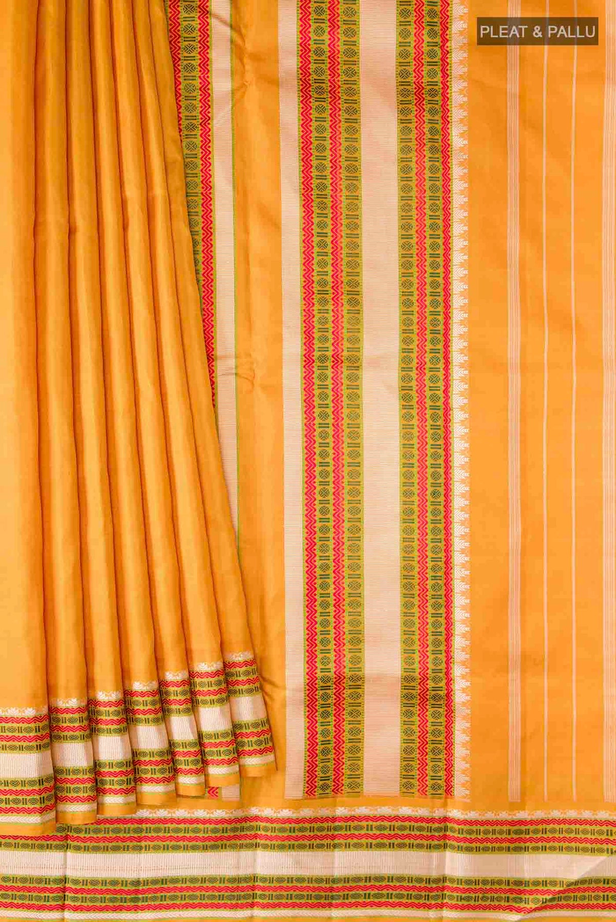 Pleats and pallu of Mustard Kanchipuram Silk Saree with Plain Body and Thread Border