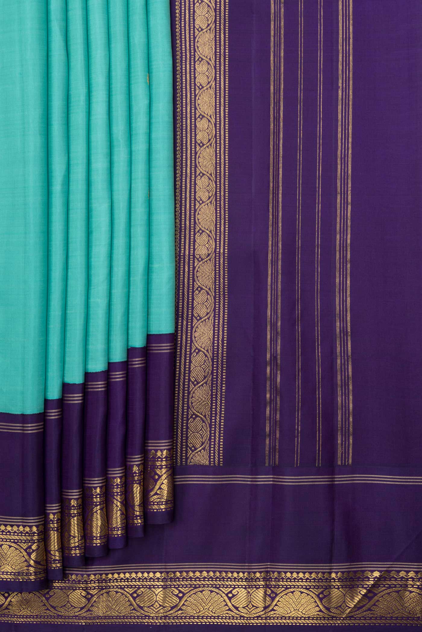 Pleats and pallu of Sky Blue Dual Tone Kanchipuram Silk Saree with Zari Butta on the body and Zari Border