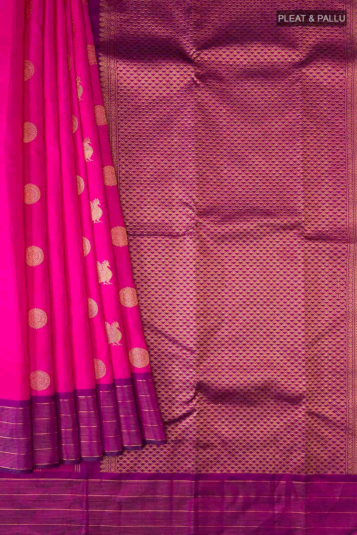 Pleats and pallu of Pink Kanchipuram Silk Saree with Zari Butta on the body and Zari Border