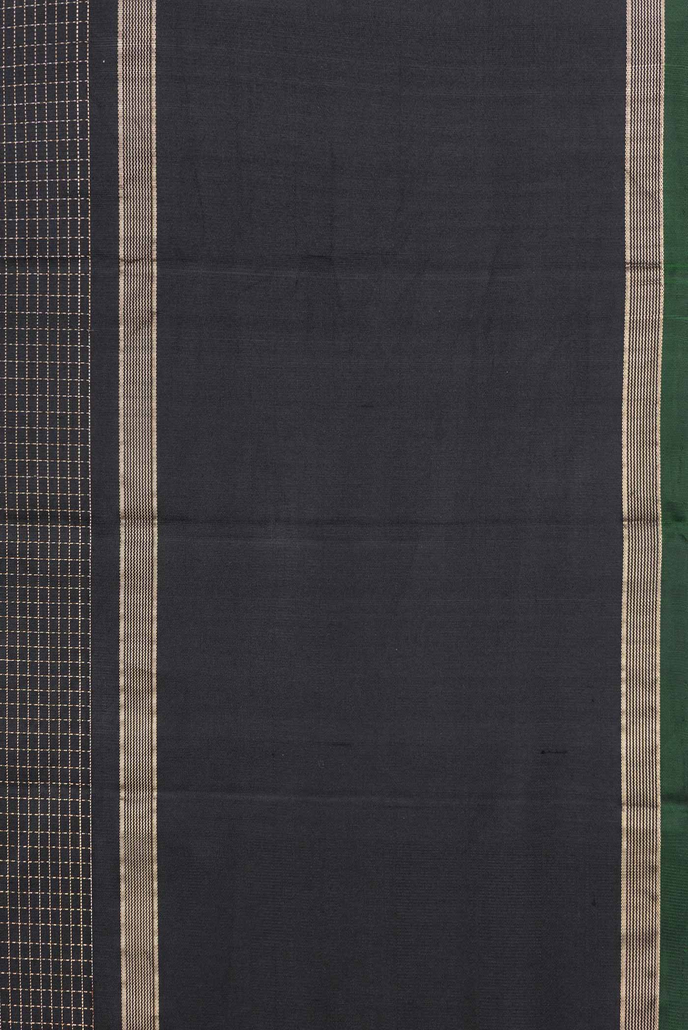 Border image of Black Dual Tone Kanchipuram Saree with Checked design on the body and Zari Border. 