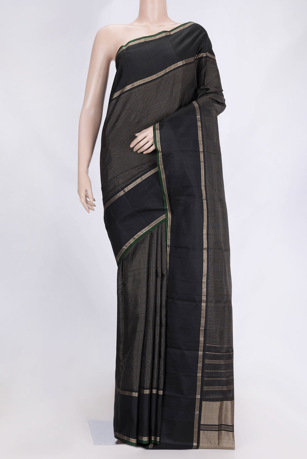Black Dual Tone Kanchipuram Saree with Checked design on the body and Zari Border.  displayed on a mannequin