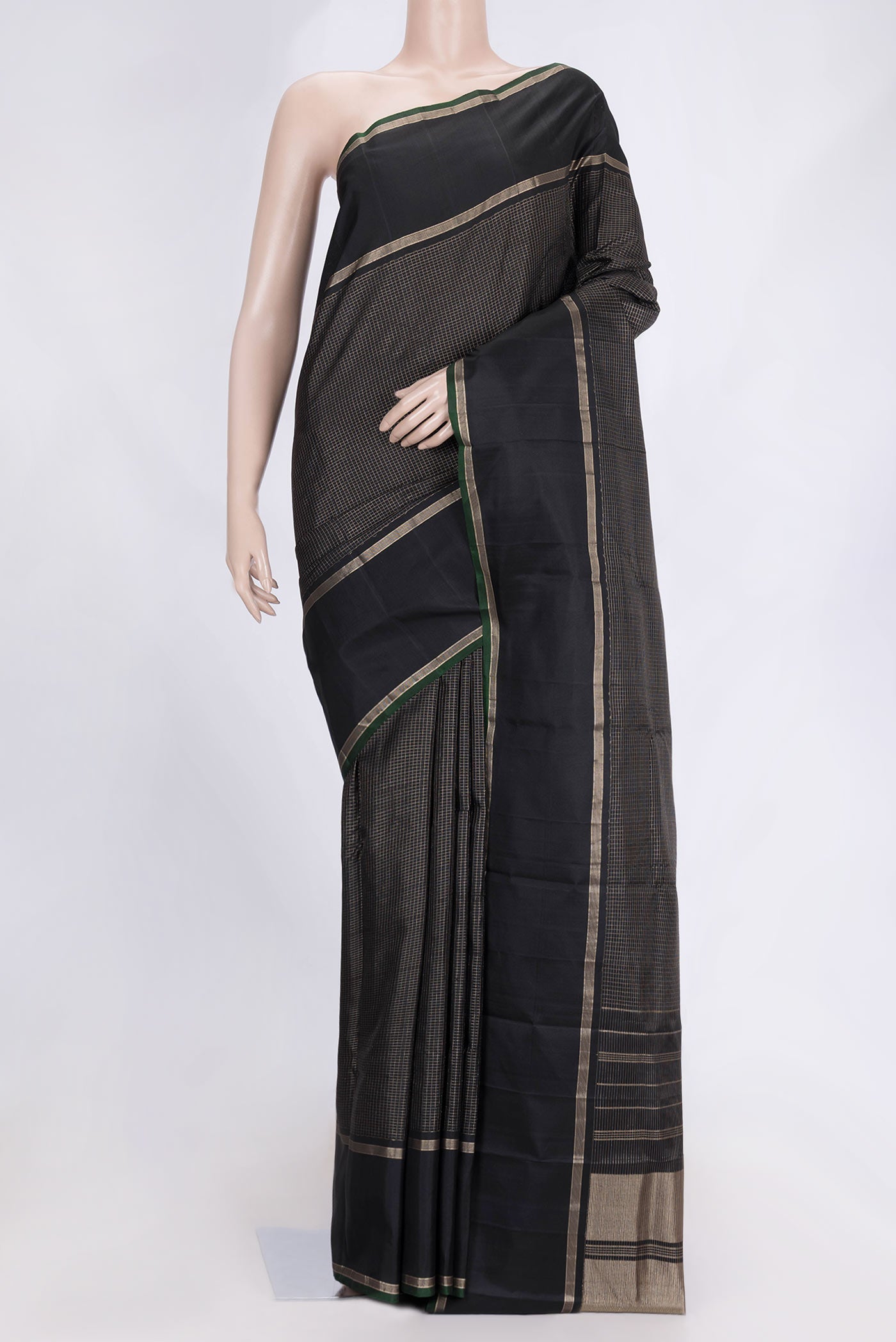 Black Dual Tone Kanchipuram Saree with Checked design on the body and Zari Border.  displayed on a mannequin