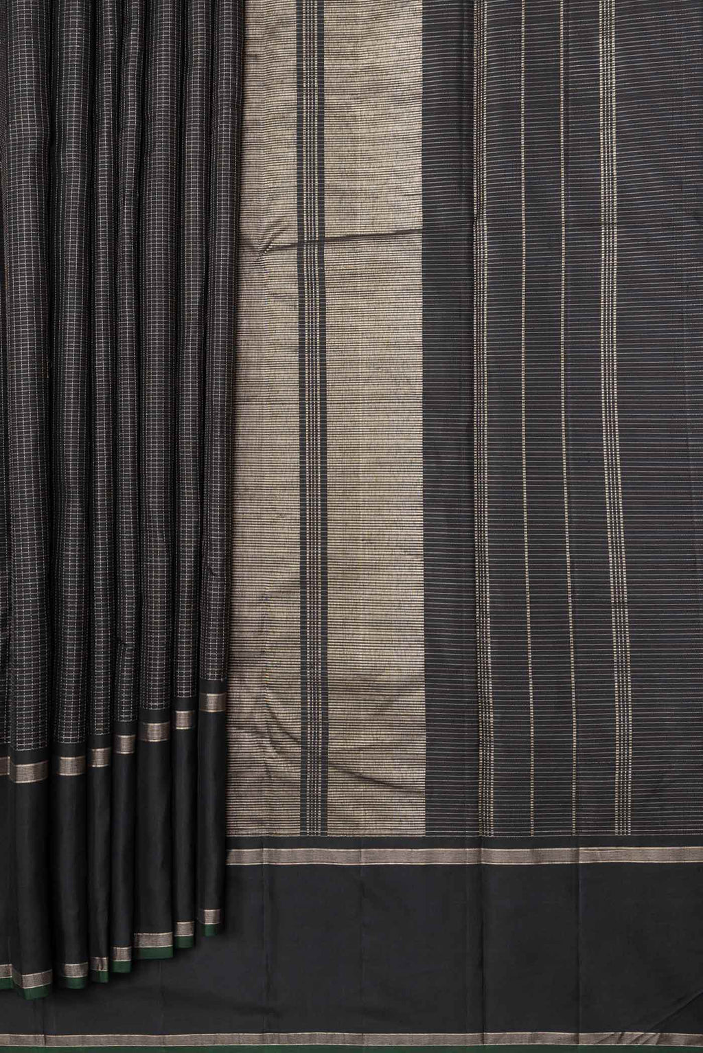 Pleats and pallu of Black Dual Tone Kanchipuram Saree with Checked design on the body and Zari Border. 