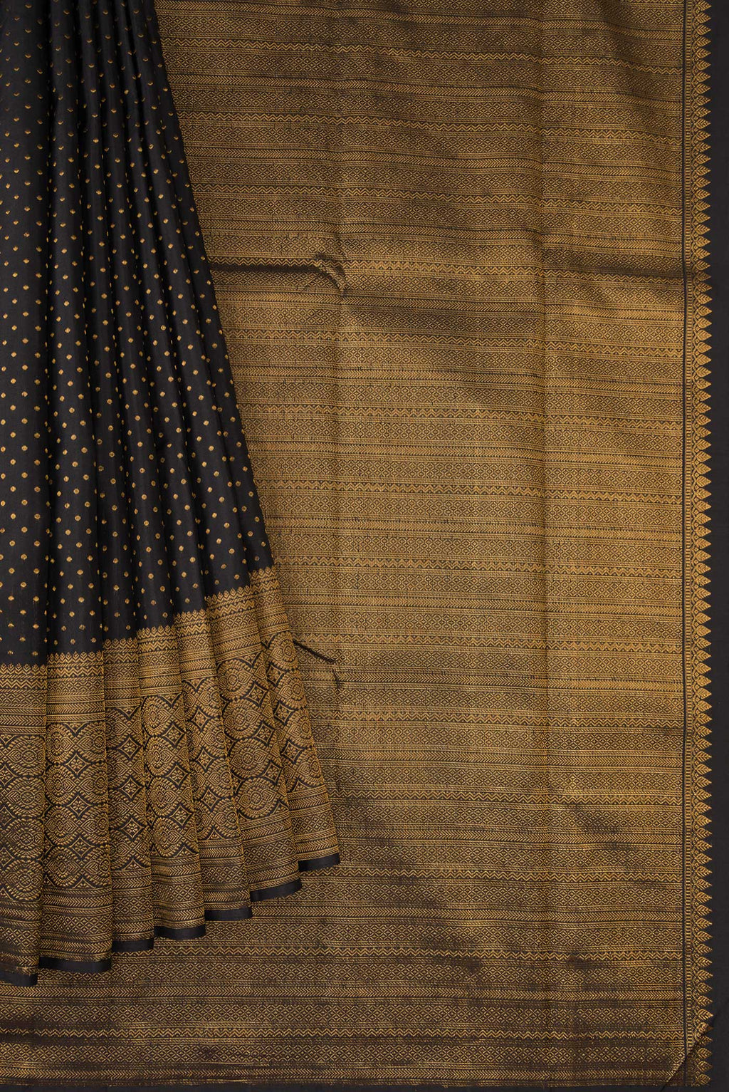 Pleats and pallu of Pure Silk Pure Zari Black Dual Tone Kanjivaram Saree with Zari Butta on the body and Fancy Border. 