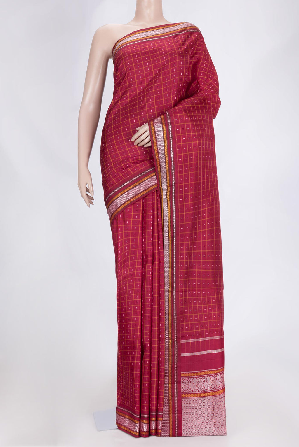 Maroon Dual Tone Kanchipuram Saree with Checked design on the body and Thread Border.  displayed on a mannequin