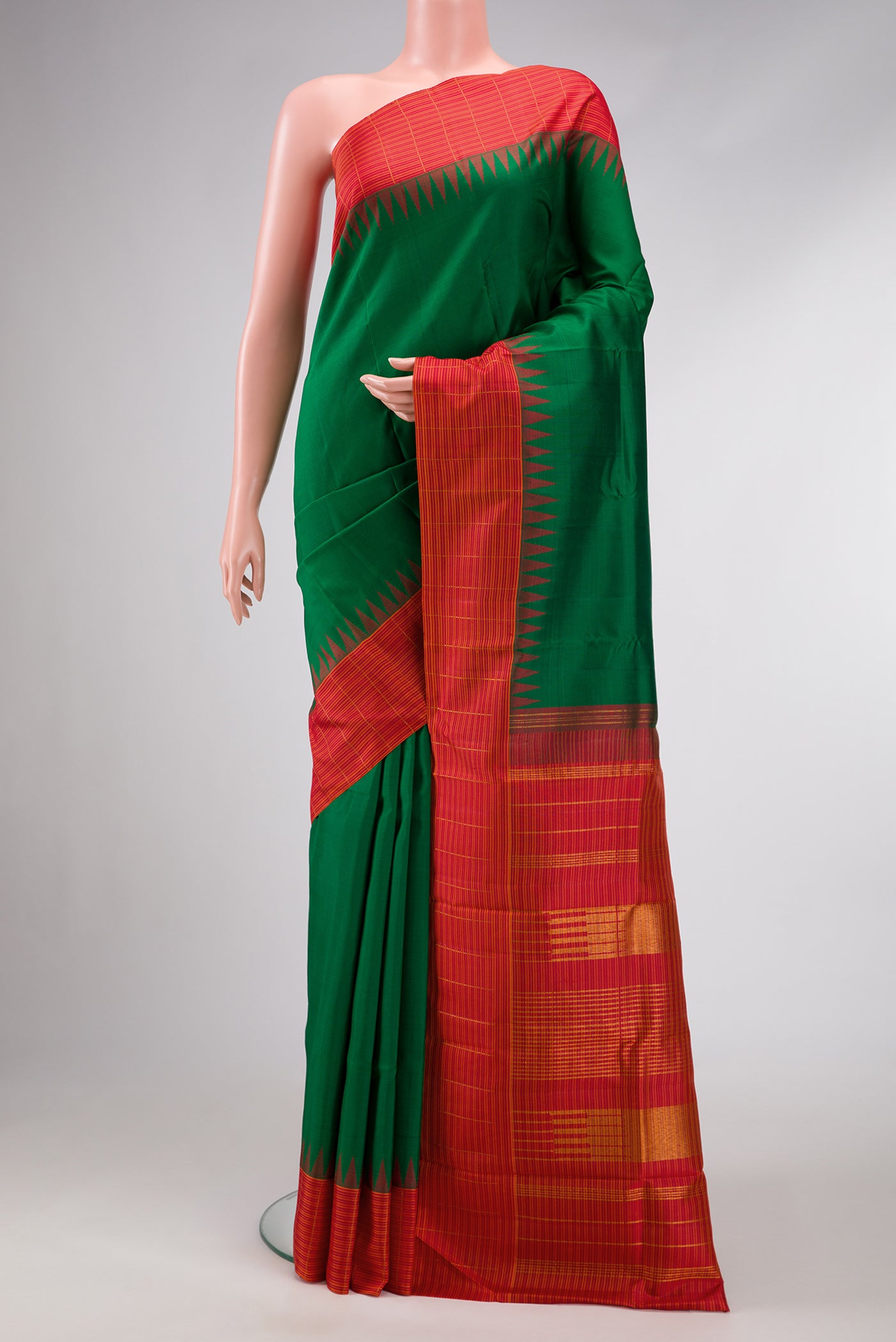 Pure Silk Pure Zari Green Dual Tone Kanjivaram Saree with Plain Body and Temple Border.  displayed on a mannequin