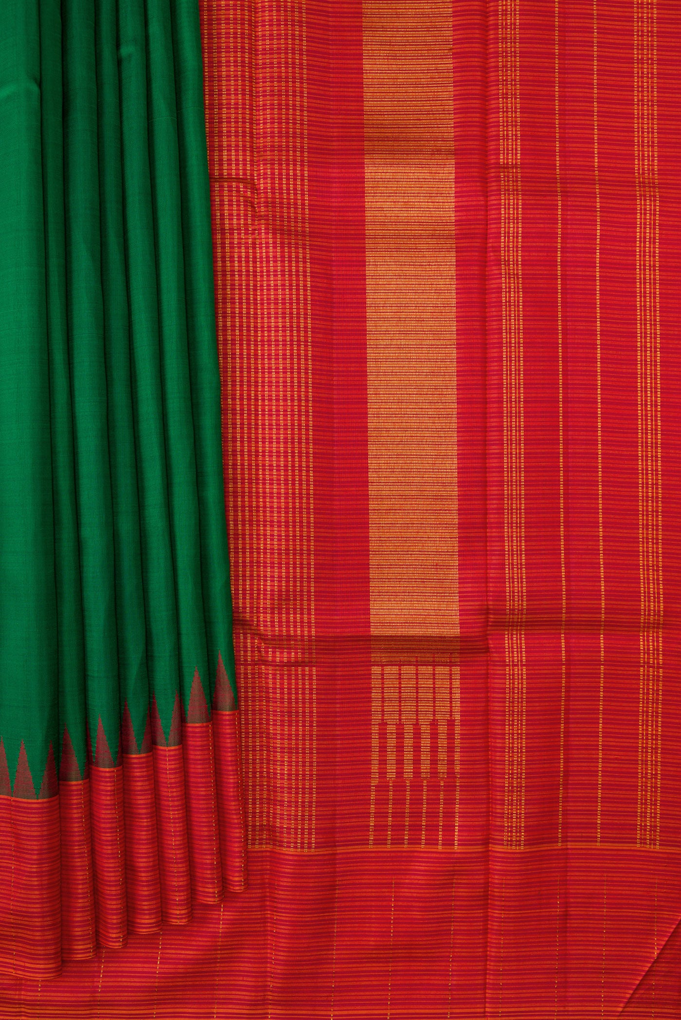Pleats and pallu of Pure Silk Pure Zari Green Dual Tone Kanjivaram Saree with Plain Body and Temple Border. 