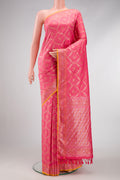 Peach Dual Tone Blended Banarasi Silk Saree with Zari Brocade on the body and Zari Border.  displayed on a mannequin