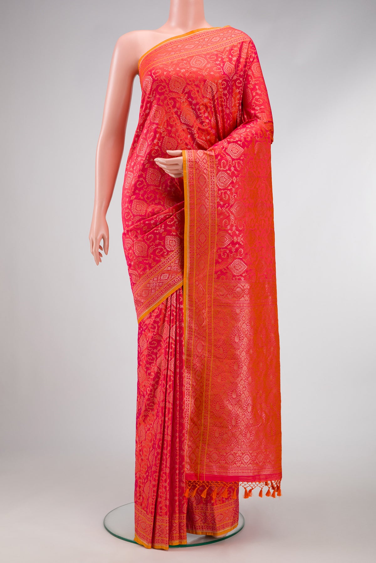 Brick Orange Dual Tone Blended Banarasi Silk Saree with Zari Brocade on the body and Zari Border.  displayed on a mannequin