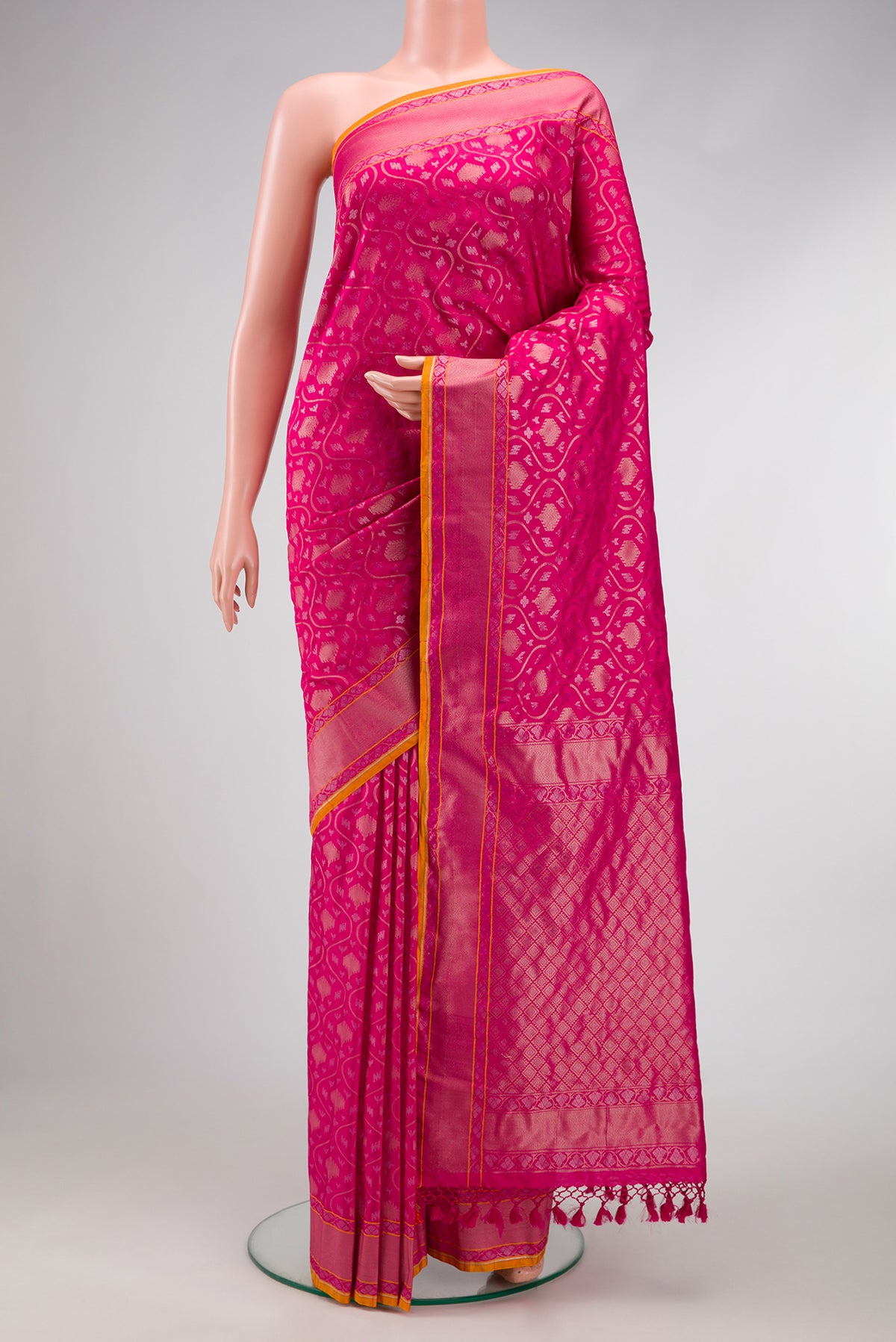 Dark Pink Dual Tone Blended Banarasi Silk Saree with Zari Brocade on the body and Zari Border.  displayed on a mannequin