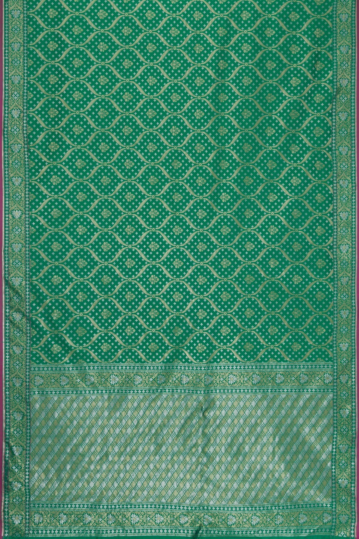 Flat view of Green Dual Tone Blended Banarasi Silk Saree with Zari Brocade on the body and Zari Border. 
