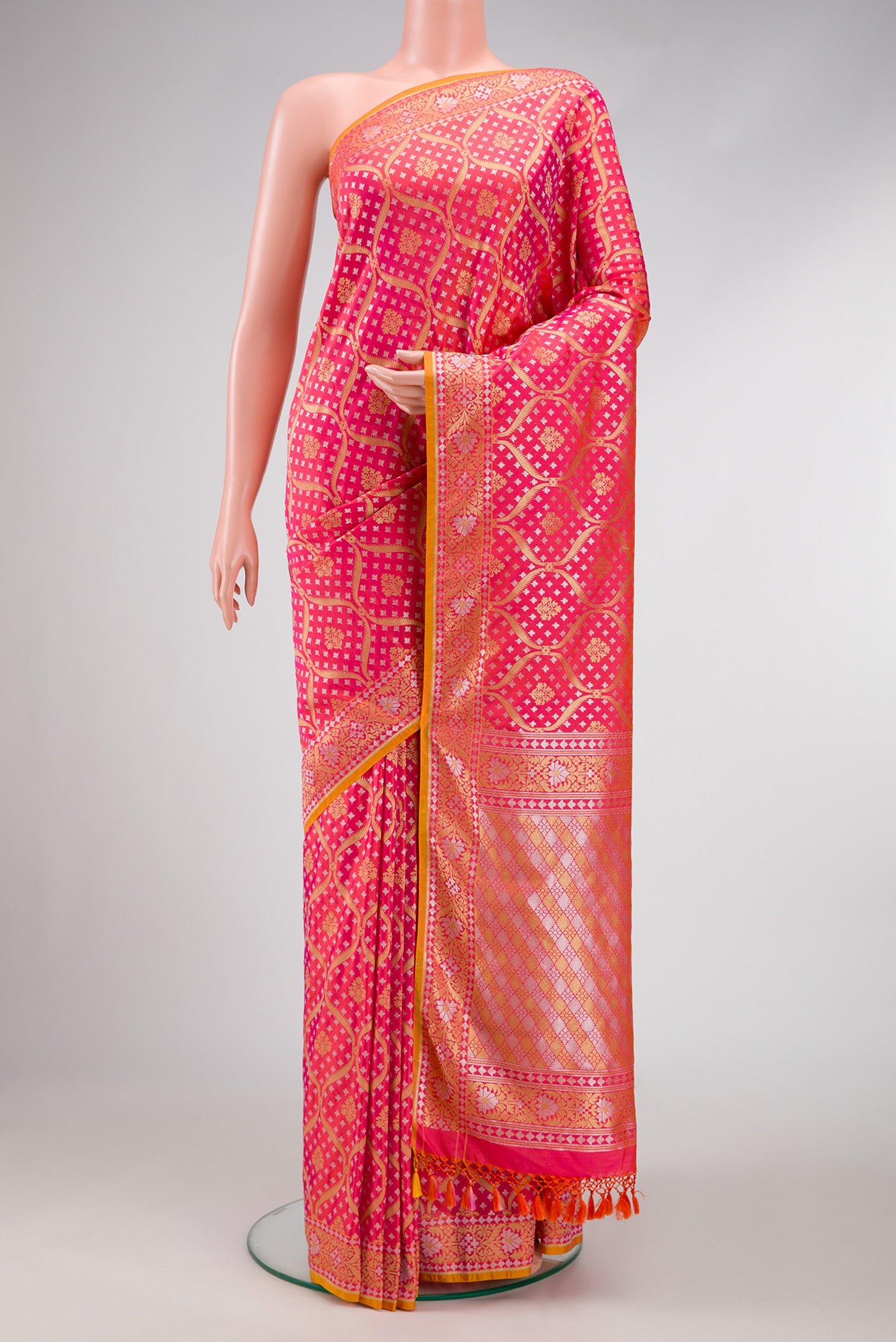 Pink Dual Tone Blended Banarasi Silk Saree with Zari Brocade on the body and Zari Border.  displayed on a mannequin