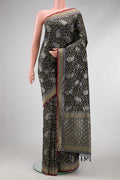 Black Dual Tone Blended Banarasi Silk Saree with Zari Brocade on the body and Zari Border.  displayed on a mannequin
