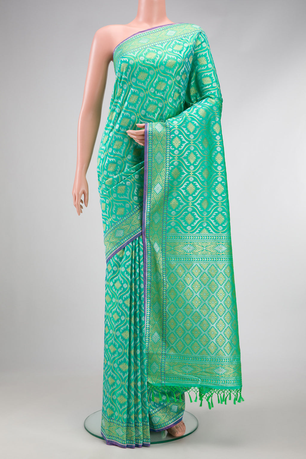 Sea Green Dual Tone Blended Banarasi Silk Saree with Zari Brocade on the body and Zari Border.  displayed on a mannequin