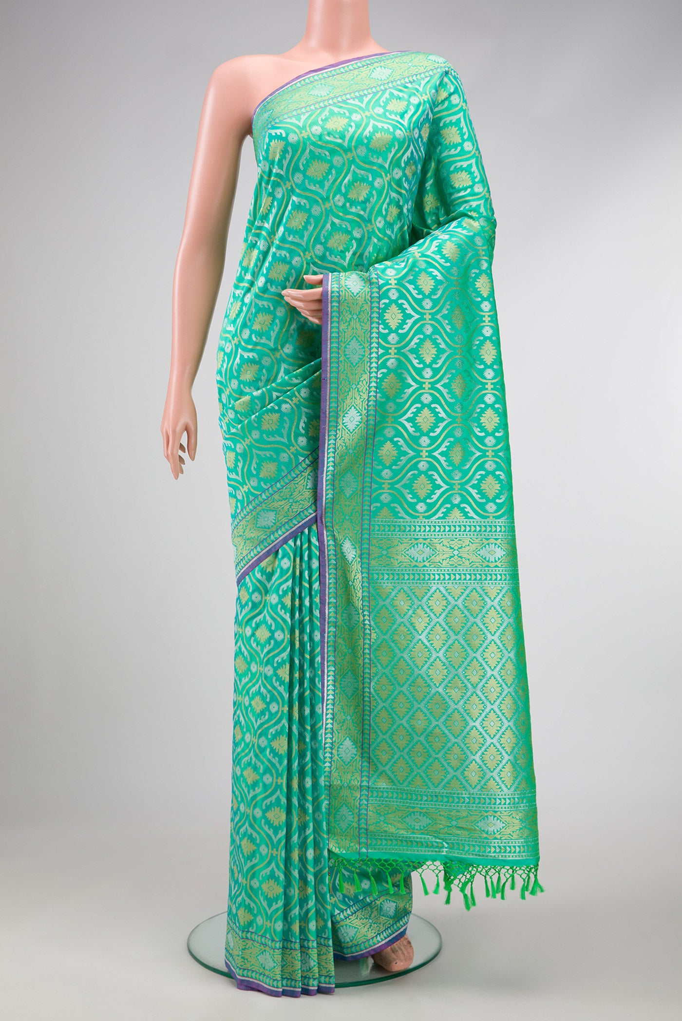 Sea Green Dual Tone Blended Banarasi Silk Saree with Zari Brocade on the body and Zari Border.  displayed on a mannequin