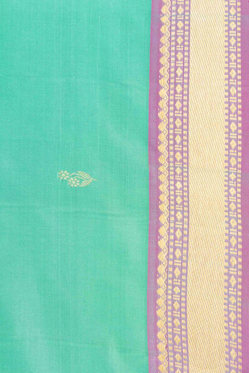 Border image of Green Dual Tone Kanchipuram Saree with Zari Butta on the body and Zari Border. 