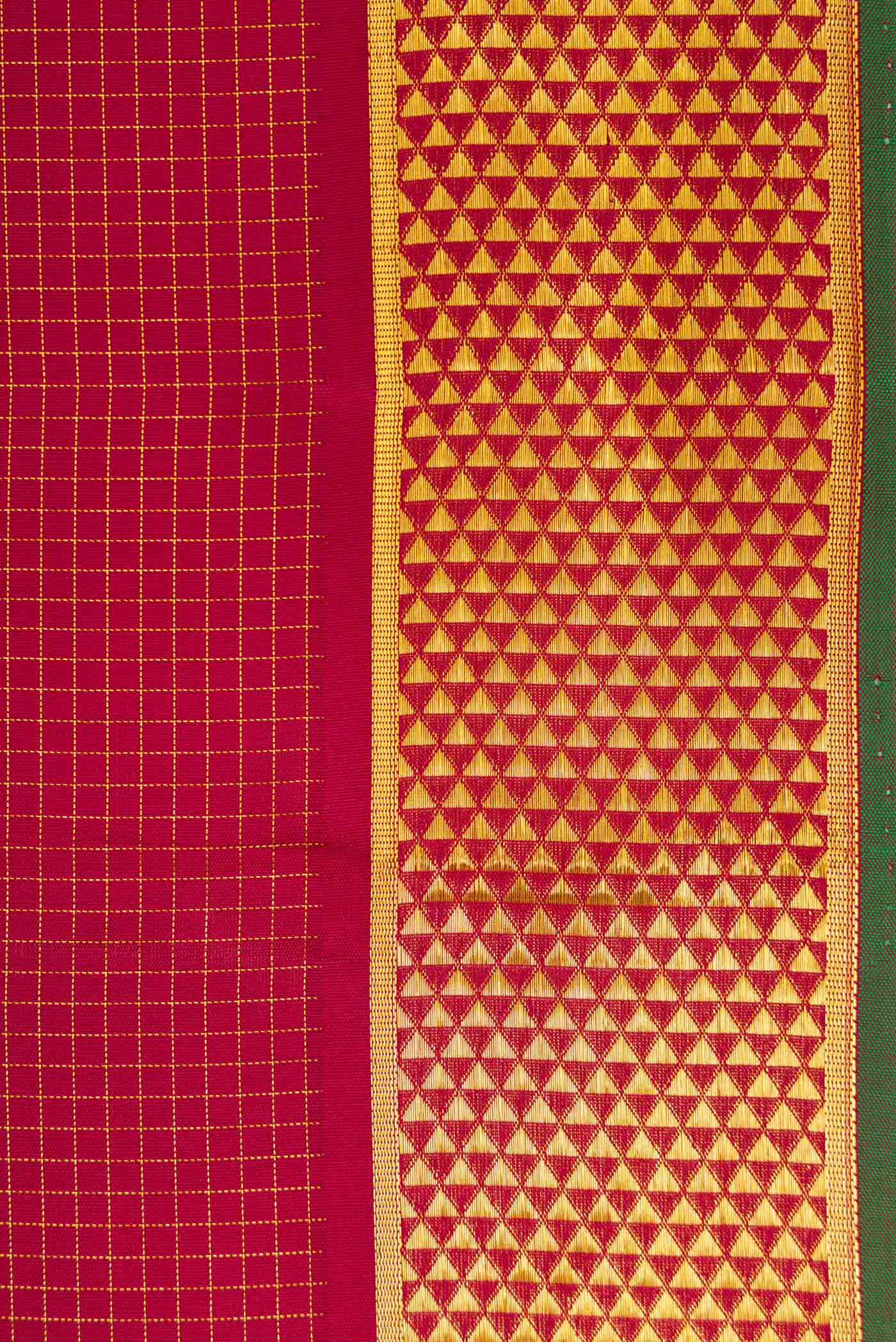 Border image of Maroon Dual Tone Kanchipuram Silk Saree with Checked design on the body and Zari Border