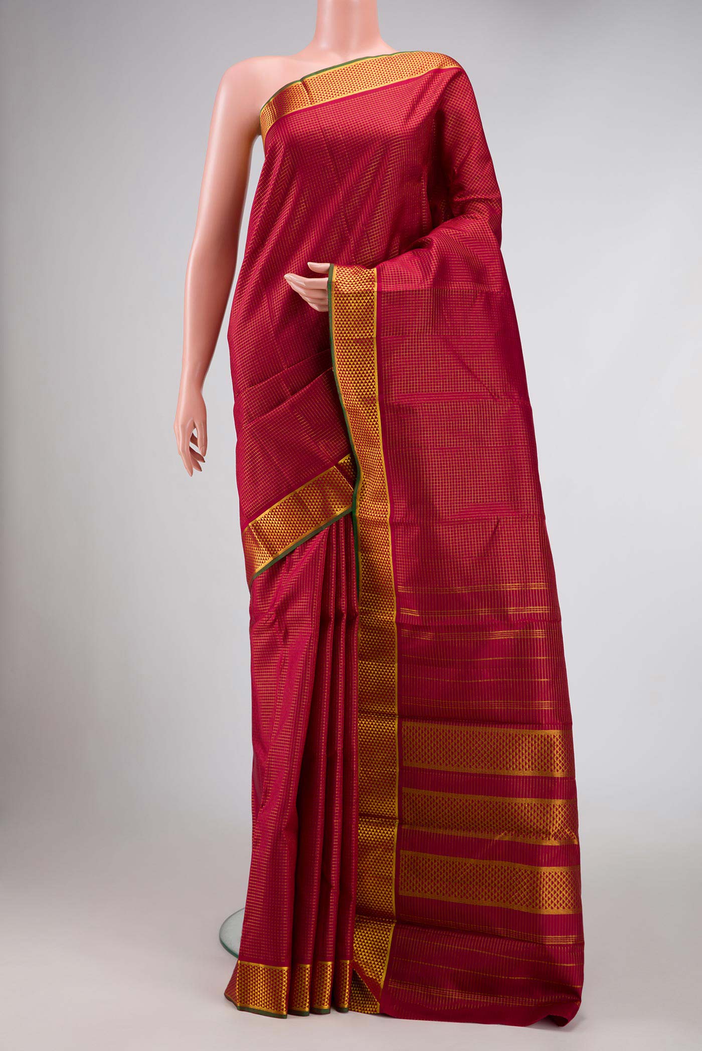 Maroon Dual Tone Kanchipuram Silk Saree with Checked design on the body and Zari Border displayed on a mannequin