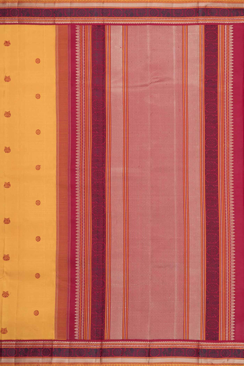 Close up image of the pallu of Mustard Dual Tone Kanjivaram Saree with Thread Butta on the body and Thread Border. 