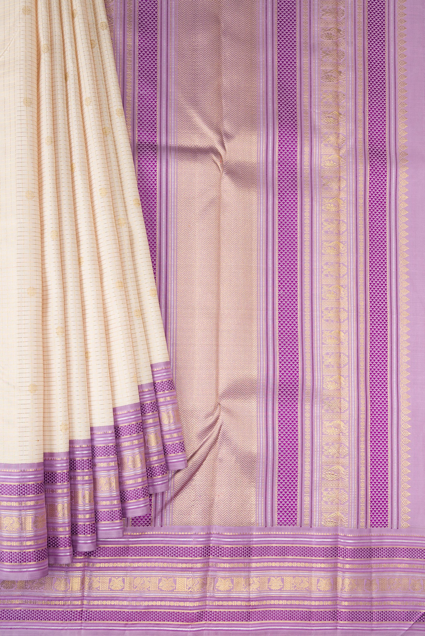 Pleats and pallu of Pure Silk Pure Zari Off White Kanjivaram Saree with Checked design on the body and Zari And Thread Border. 